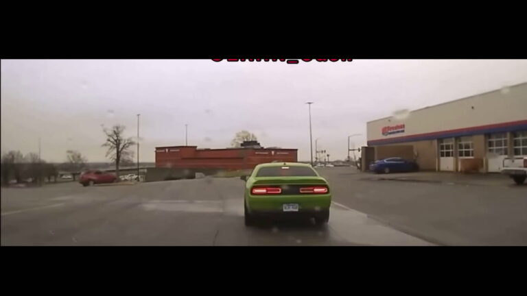 Green Dodge Chaalenger Gets Away